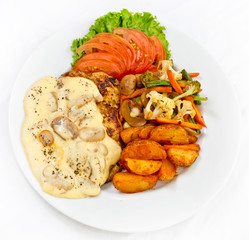 Peri peri Chicken with Button mushroom gravy, Saute Vegetables, Spicy fried Potatoes with Tomato Lettuce Salad.