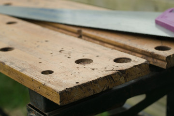 Wooden workbench with saw for DIY and carpentry work