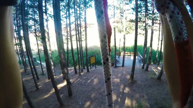 POV Of Brave Person Ziplining In Adventure Park