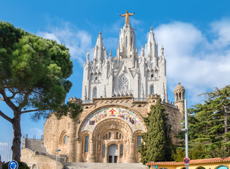 Fototapeta na wymiar The famous attraction of Barcelona - Expiatory Church of the Sacred Heart of Jesus is a Roman Catholic church and minor basilica located on the summit of Mount Tibidabo
