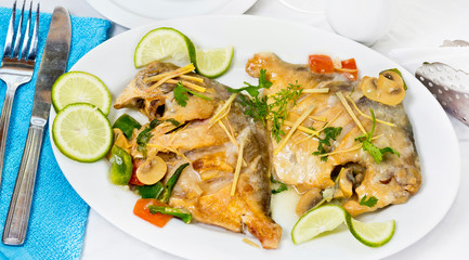 Pomfret fish pieces on plate, spicy Indian dish. Popular amongst Bengalis and south Asia for it's taste.