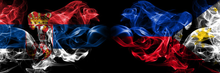 Serbia, Serbian, Philippines, Philippine smoky mystical flags placed side by side. Thick colored silky smokes flag concept