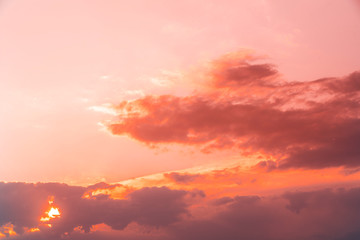 Beautiful golden  sunset sky with colorful clouds.