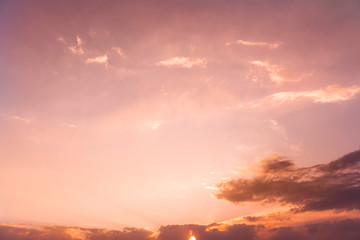 Beautiful golden  sunset sky with colorful clouds.