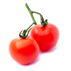 Close-up view branch of two fresh red cherry tomatoes with green leaves isolated on white background. Healthy food concept