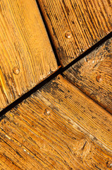 Wooden panels and boards of a rural house, Italy.