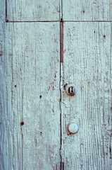 Wooden panels and boards of a rural house, Italy.