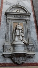 Obraz premium Statue of Janos Simor, archbishop of Eszterghom, count and cardinal during 19th century, placed on decorative pedestail in Esztergom basilica. 