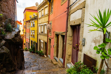 Street view on the beautiful old buildings with portuguese houses