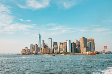 New York City New Jersey, NYC/ USA - 08 21 2017: Amazing sunset on New York City Hudson River on public transport staten island ferry with beautiful panorama view to NYC Manhattan skyline