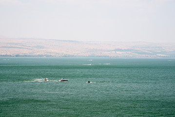 View of the Sea of Galilee with boats. Summer, Israel.