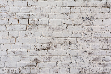 Fototapeta premium Empty Old Brick Wall Texture. Painted Distressed Wall Surface. Grungy Wide Brickwall. Shabby Building Facade With Damaged Plaster.