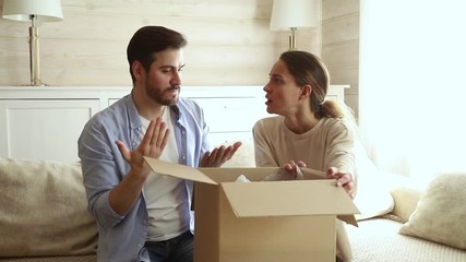 Couple open parcel feels dissatisfied with damaged broken goods inside