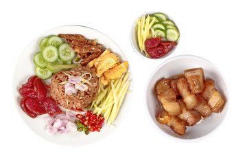 Isolated of Fried jasmine rice with shrimp paste,call Kao Klok Kapi in Thai, with sidedish.