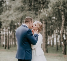 Fototapeta premium Happy bride and groom on their wedding in garden
