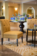 Cozy and elegant foyer area with retro-style armchairs	