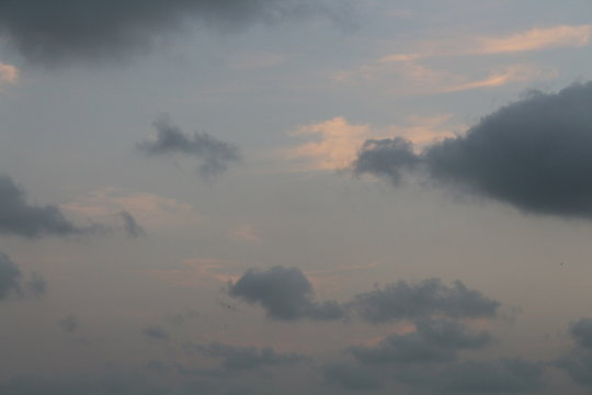 dusky sunset sky with clouds