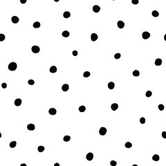 Vector black and white polka dots seamless pattern background