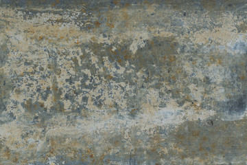 Old gray wall with yellow and brown spots as an abstract background
