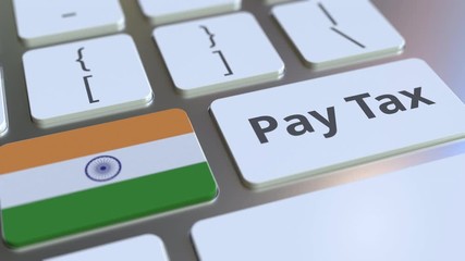 PAY TAX text and flag of India on the buttons on the computer keyboard. Taxation related conceptual 3D animation