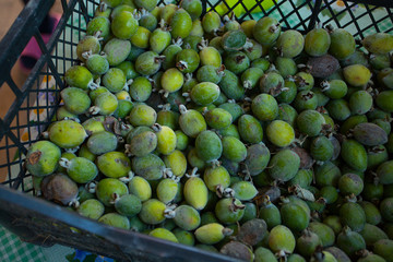 beautiful ripe and juicy feijoa on  green background