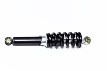 a brand new clean black and silver motorcycle shock absorber over white, this shock is also used on...