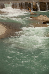 Beautiful landscape of  small waterfall of city river