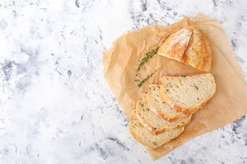 Slices of fresh bread on light background
