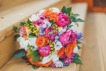 Beautiful bright wedding bouquets and wedding rings 1
