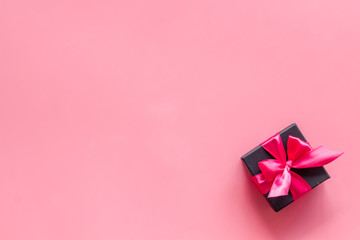 box with present for holiday on pink background top view mockup