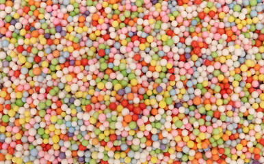 Fototapeta na wymiar Colorful styrofoam balls foam polystyrene mixed colors