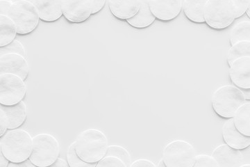 Hygiene cotton pads for frame on white background top view copyspace