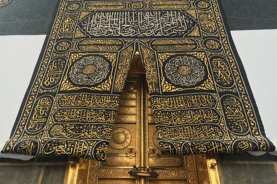 MECCA, SAUDI ARABIA - September 2019. The door of the Kaaba holy mosque Al-Haram in Mecca Saudi Arabia. Muslim pilgrims from all over the world gathered to perform Umrah or Hajj.