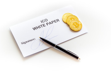 White paper ICO, coins, pen on white background