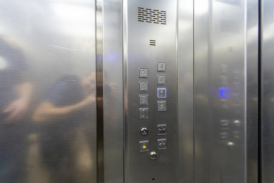 panel with buttons in a modern silver elevator