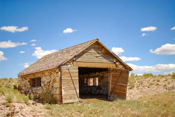 Fototapeta na wymiar USA, Nevada, Nye County, Monitor Valley, Potts Ranch. An amandoned stone garage style stable building at this old homestead site.
