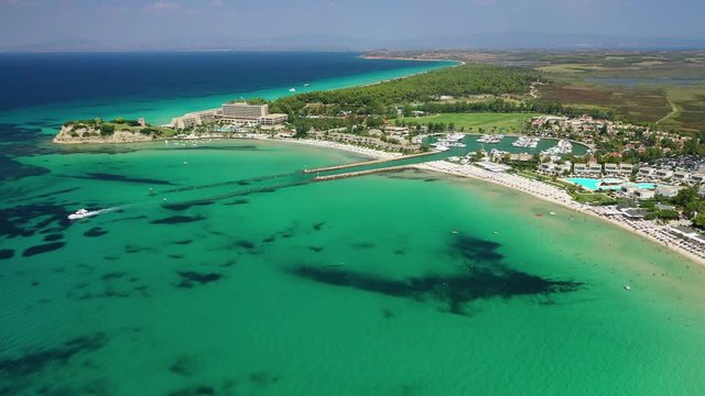 Aerial drone video from iconic village of Sani with unique nature in North Kassandra peninsula, Halkidiki, North Greece