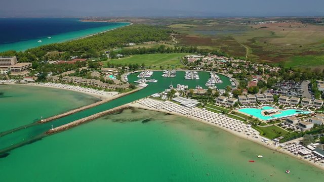 Aerial drone video from iconic village of Sani with unique nature in North Kassandra peninsula, Halkidiki, North Greece