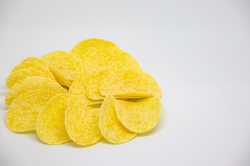heap of potato chips isolated on white background,A bunch of potato chips on a white, closeup