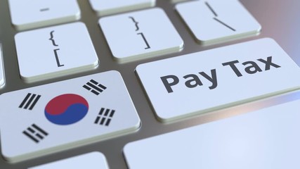 PAY TAX text and flag of South Korea on the buttons on the computer keyboard. Taxation related conceptual 3D animation