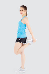 Naklejka premium Beautiful young asian woman in sport standing stretch muscle leg exercise with healthy isolated on white background, asia girl shape fit warm up and workout training for healthy, wellness concept.