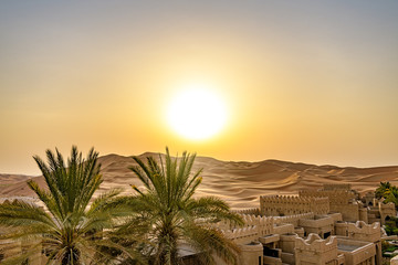 Qasr Al Sarab in Liwa, Al Dhafra, Abu Dhabi, United Arab Emirates at sunset.