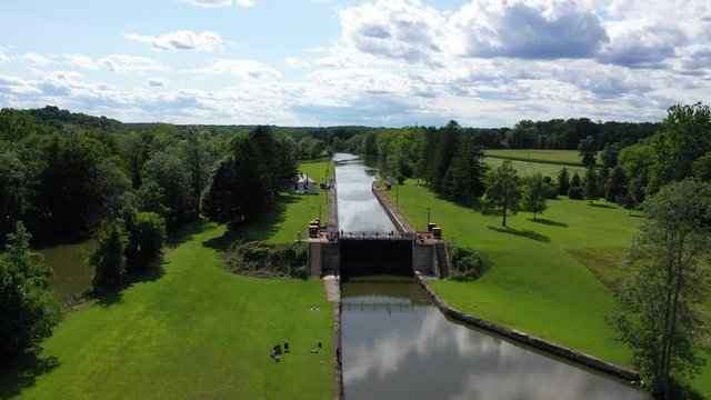 Aerial Erie Canal lock 29 Palmyra New York. Pioneer engineering wonder. 363 miles long man made waterway built in 1817. Transport of cargo from eastern ports and cities.