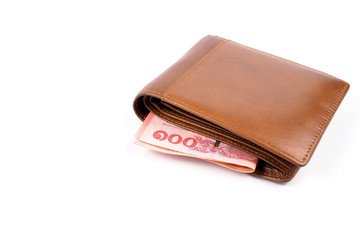 Brown wallet with money on white background