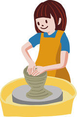 陶芸教室でろくろを回す女性