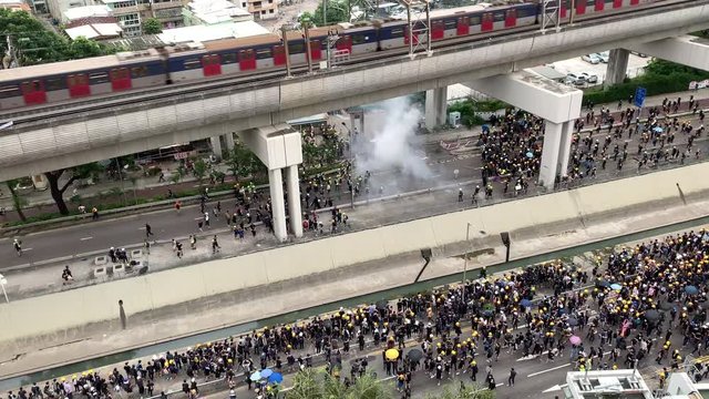 the protesters and tear gas in yuen long, hong kong