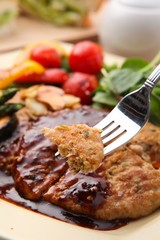 Fork cutlet on a plate