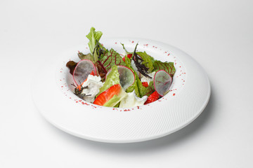 Greek strawberry salad on a white background