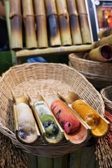 "Khao Lam" is sticky rice soaked in coconut milk and baked in a length of bamboo. Thai dessert.