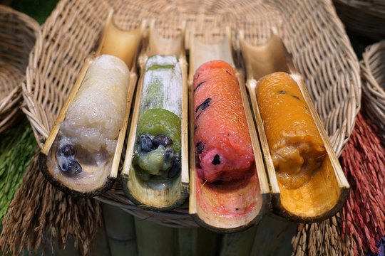"Khao Lam" is sticky rice soaked in coconut milk and baked in a length of bamboo. Thai dessert.